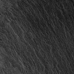 Dark grey black slate background or texture.