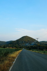 Sky, clouds and views of mountains and rice fields
