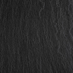 Dark grey black slate background or texture.
