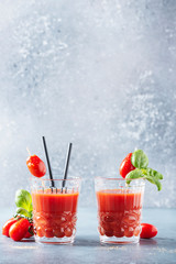 Vegan tomato juice with basil and peppe