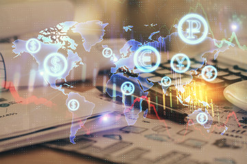 Fototapeta premium Double exposure of financial chart drawings and desk with open notebook background. Concept of forex market