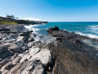 Fototapeta na wymiar Makaluapuna Point rocky shoreline in Maui 