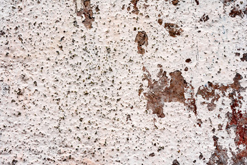 Texture of a concrete wall with cracks and scratches which can be used as a background