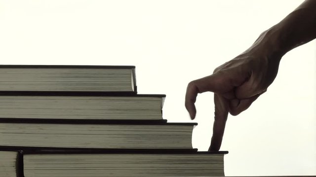 Business and Education Concept - Finger people moving step up
