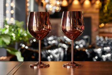 gold metal wine glass, dark background