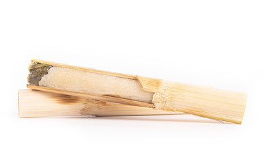 Bamboo Sticky Rice Dessert on white background.