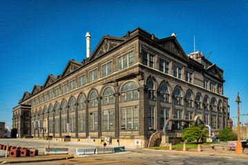 Fototapeta na wymiar old power plant -in St Louis riverfront - windows and brick walls wirh sandstone decoration