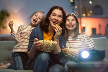 Mother and daughters spending time together.