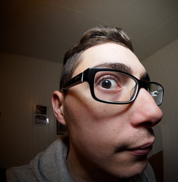 Fish Eye View Of Young Man Wearing Eyeglasses