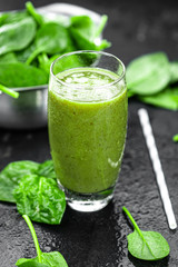Homemade spinach smoothie (close up; selective focus)