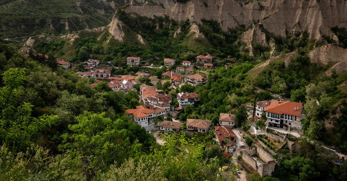 Panorama of Melnik, Bulgaria and sand pyramids from above. Beautiful landscape of the smallest bulgarian town, mountains at spring.