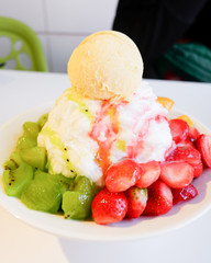 Mixed Fruit Bingsu. A bowl of milk shaved ice served with fresh fruits