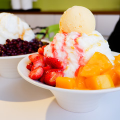 Mixed Fruit Bingsu. A bowl of milk shaved ice served with fresh fruits