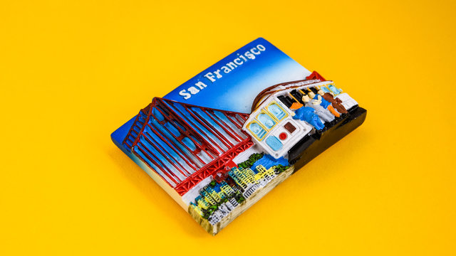 San francisco magnet on yellow background , golden gate bridge, travel concept