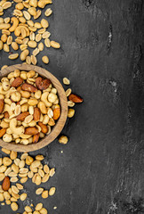 Roasted and salted nuts (close up; selective focus)