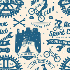 Set of bmx extreme sport club seamless pattern, background. Vector. Seamless pattern design with bmx cyclist, bmx sprocket and chain silhouette.