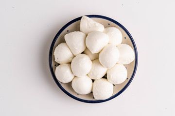 mozzarella in white bowl