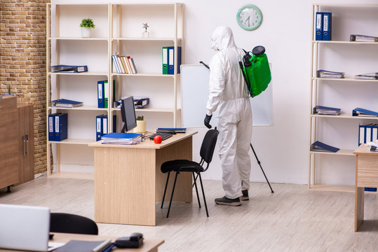 Contractor disinfecting office for COVID-19 coronavirus