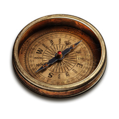 Vintage brass compass isolated on white background © lotus_studio