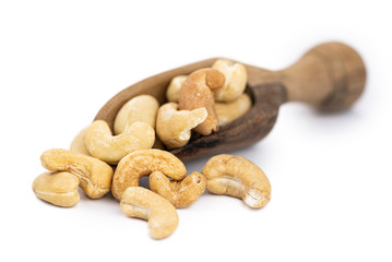 Cashew Nuts isolated on white background (selective focus)