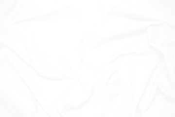 White  fabric cloth background abstract with soft waves , flowing draped cloth in rippled elegant curves and wrinkled creases , soft focus, textured background and abstract