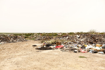 View of landfill outdoors. Concept of soil pollution