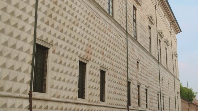 Tilt up on Palazzo dei Diamanti street side in Ferrara, Italy
