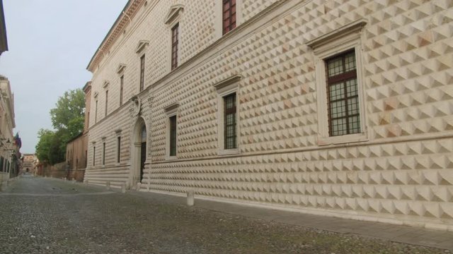 Pan right on Palazzo dei Diamanti from Corso Ercole I d'Este in Ferrara, Italy