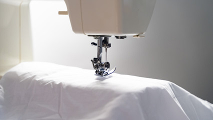 Electric sewing machine , thread in needle