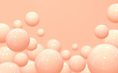 Glossy spheres on pastel pink background