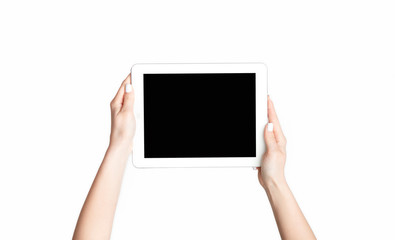 View of girl hands holding tablet computer with mockup for design on screen against white background, panorama