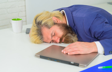 Naklejka premium Office worker. Tired businessman sleep in office. Sleepy bearded manat table. Leadership. CEO. Business expert. Businessman. Emotional. Office work. Businessman in suit.