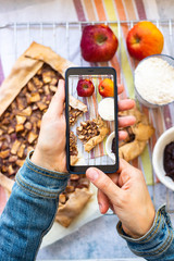 Phone photography of vegan food. Make picture of apple tart pie.