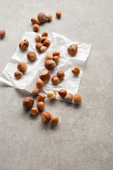 Close up of large group of Hazelnuts on concrete surface