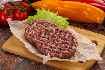 Raw burger cutlet