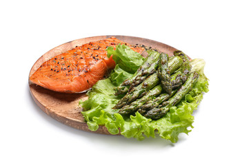 Cooked asparagus with salmon on white background
