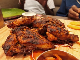 Flamed grilled spicy Peri-Peri chicken.