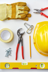 repair, building and renovation concept - different work tools on white background