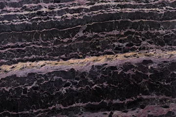 Fotobehang Aantrekkelijke donkere marmeren achtergrond voor uw natuurlijke ontwerp. Hoge kwaliteit textuur. © Dmytro Synelnychenko
