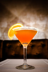 cocktail with lemon orange wineglass
