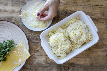 Preparing Traditional homemade Italian seafood lasagna
