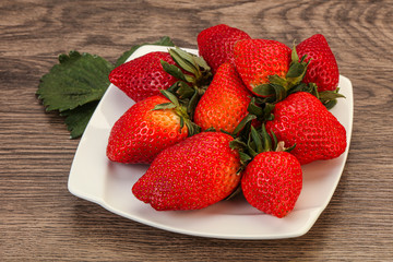 Ripe sweet strawberry with leaf