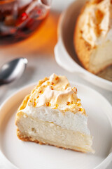 Delicious homemade cheesecake with glazed merengue.