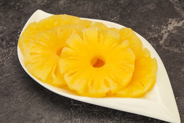 Marinated pineapple rings in the bowl
