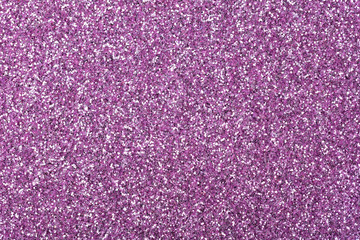 Glitter texture in exquisite violet tone, new background as part of your design work.