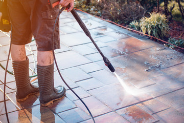 Outdoor floor cleaning with high pressure water jet
