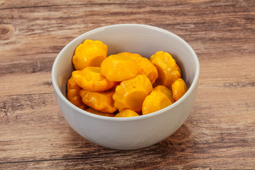 Marinated yellow patisson in the bowl