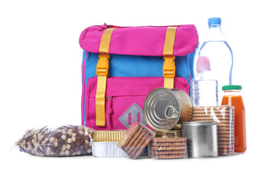 Schoolbag with different products on white background. Concept of Backpack Food Program