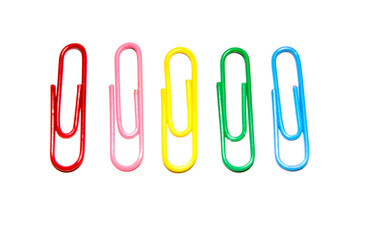 Push pins and paper clips in different colors isolated on white background.
