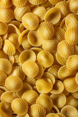 Full background of dry raw uncooked pasta